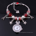 Nouvelle arrivée Lady glass beads eiffel towerl et star charms quartz montre-bracelet femme